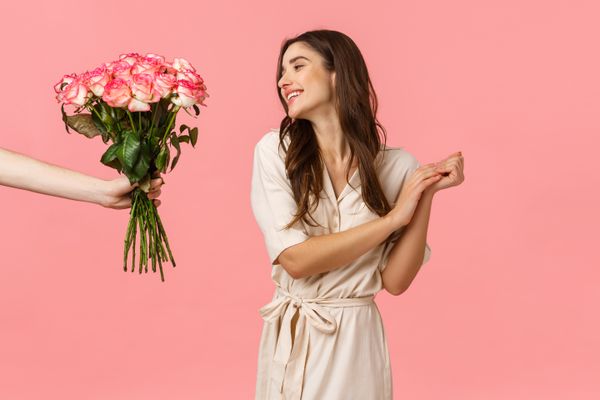 Woman receiving flowers